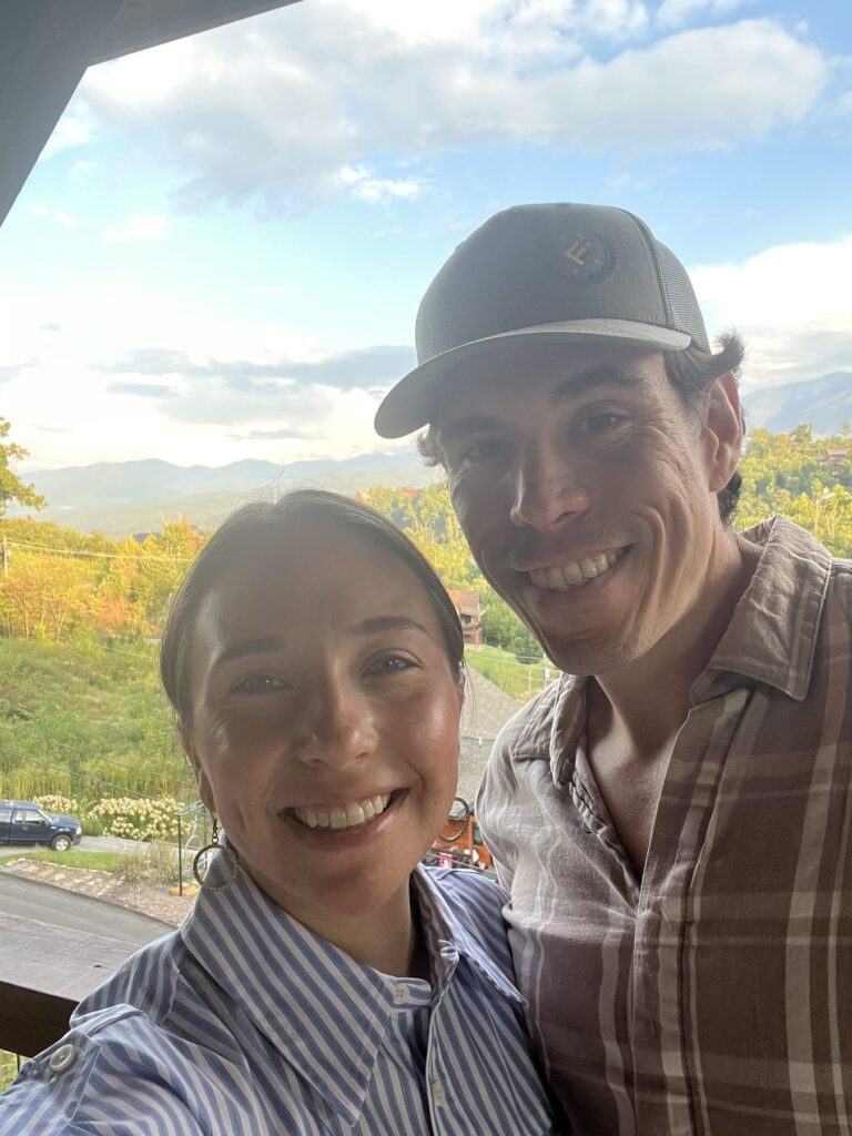 Jaime Gallardo and Tawnya Jones at a mountain overlook in the Smoky Mountains